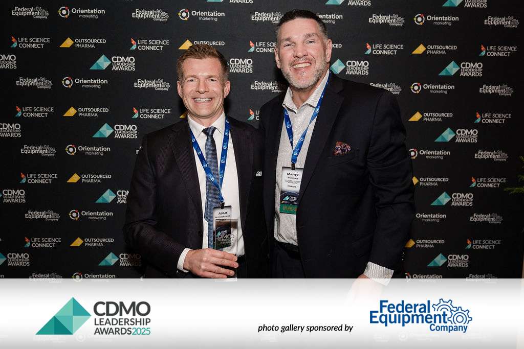 Adam Pietruszkiewicz and Marty Henehan with CDMO Leadership Awards Champion in International Biologics for Mabion - DCAT Week 2025, New York